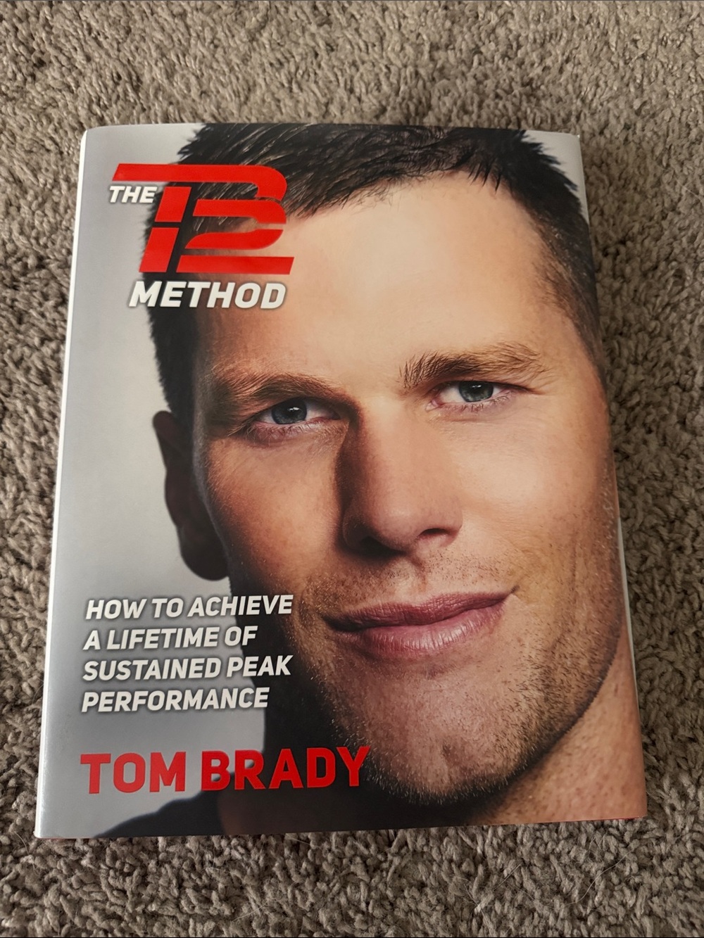 The TB12 Method Hardcover Book - Red & White Cover